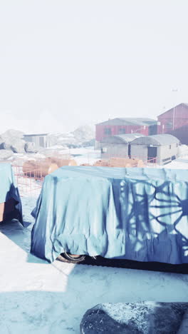 remote antarctic research station in snowy landscape