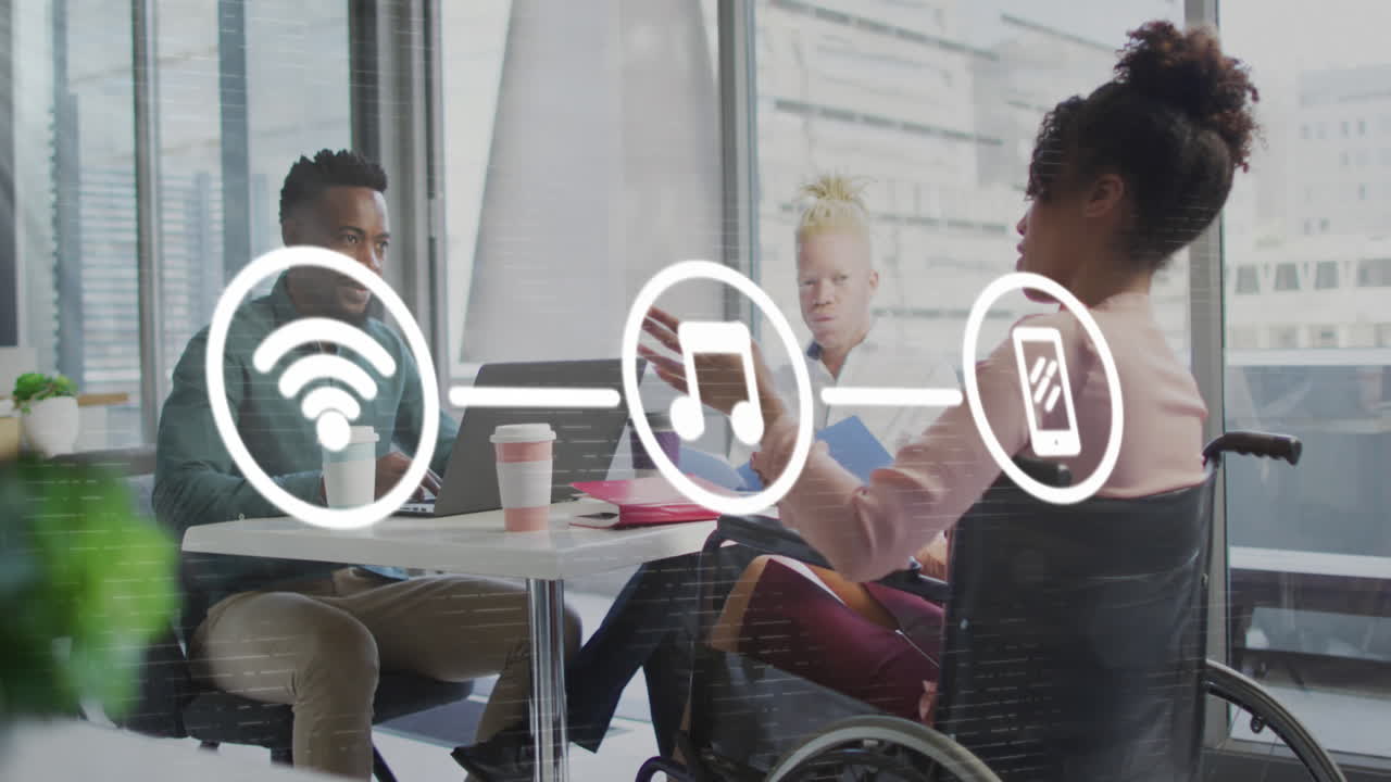 Animation of flowchart of icon over diverse coworkers discussing reports on laptop in office