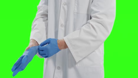 caucasian male doctor on green screen background