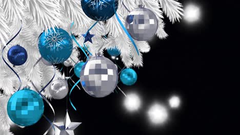 Animation-of-baubles-on-christmas-tree-over-lights-on-black-background