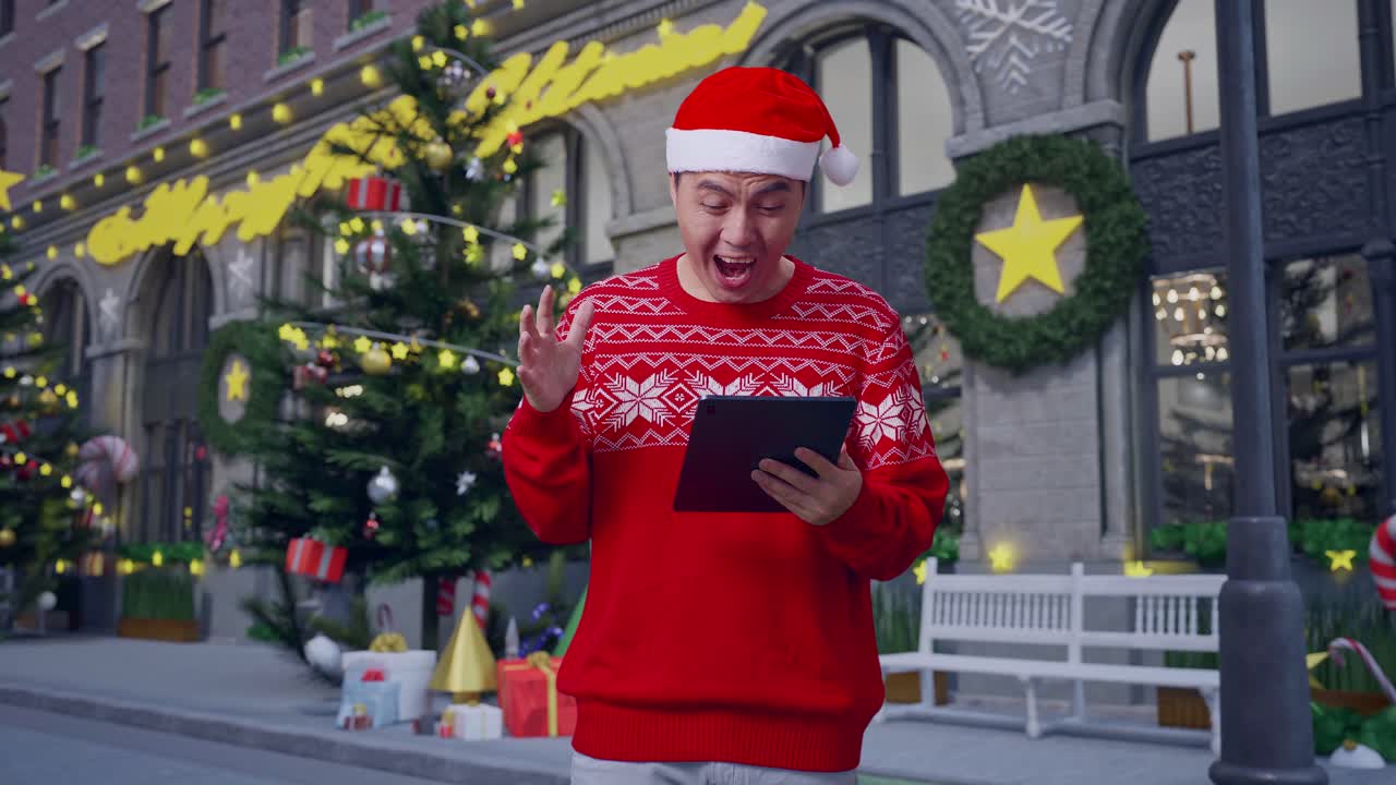 hombre sorprendido por la tableta en las decoraciones de navidad