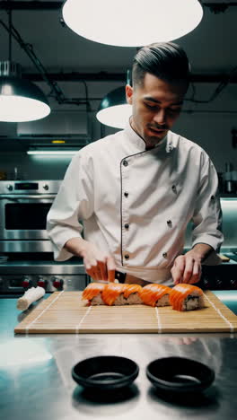 sushi chef preparing salmon sushi