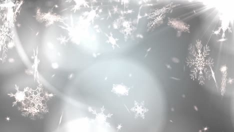 animation of snow falling at christmas over light spots