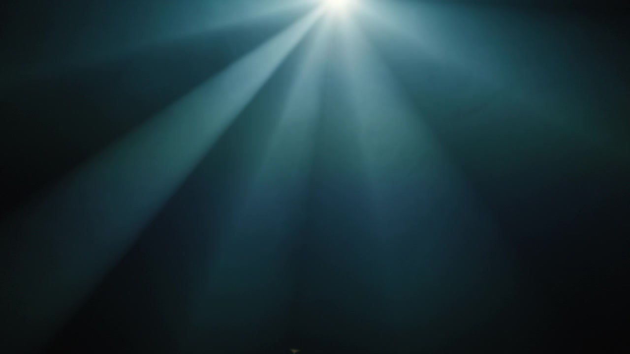 Volumetric Light Rays Shining on a Dark Background
