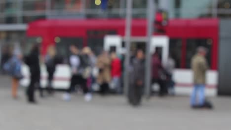 Blurry-people-moving-in-downtown-Erfurt,-historic-city-in-Germany