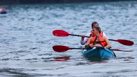 couple kayaking together in krabi, thailand