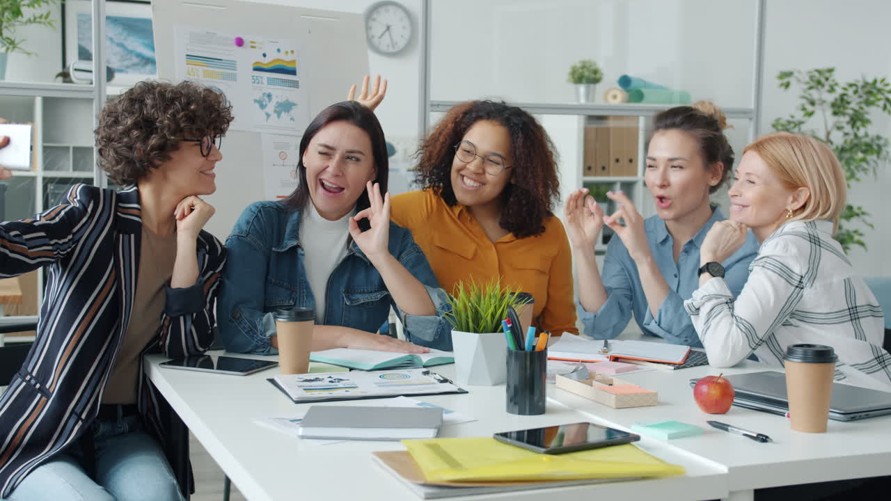 Happy Women Business Team Taking Selfie in Office