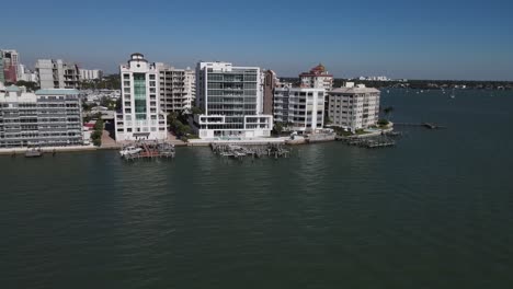 stunning orbiting aerial of golden gate point, downtown sarasota, florida