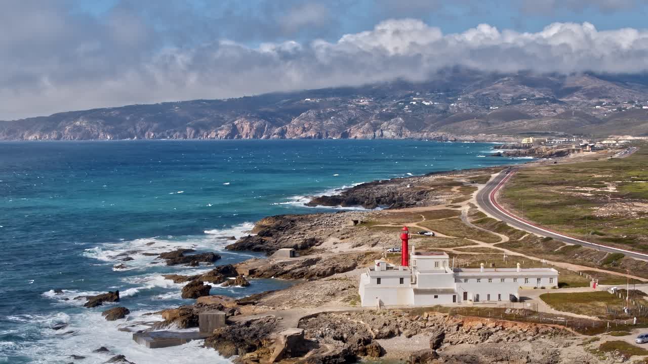 Coastal view of Portugal with lighthouse and rocky shore