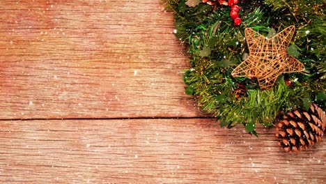 Christmas-decoration-on-wood-combined-with-falling-snow