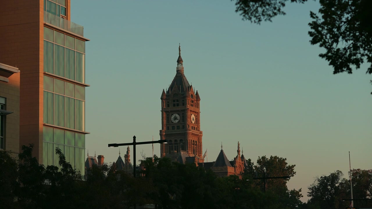 Salt Lake City County Building at sunset surrounded by trees - slow motion 4K