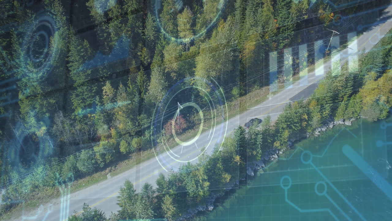 Two dark sedans traveling along asphalt road through forest beside teal lake showing HUD overlay