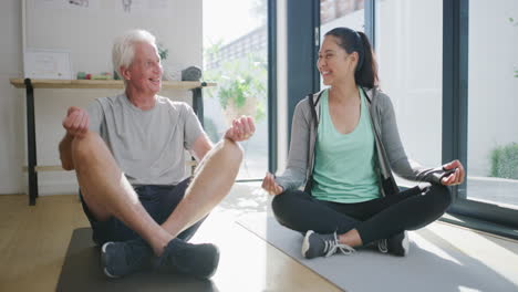 an attractive young physiotherapist sitting