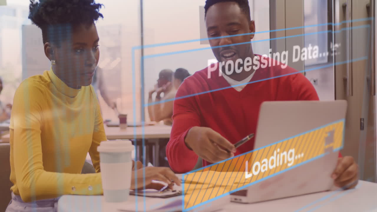 Animation of data processing text over diverse business people working in office