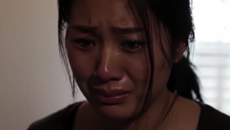 a heartbreaking moment captured: a close-up of a young woman's emotional struggle revealing pain and sorrow in two intimate frames