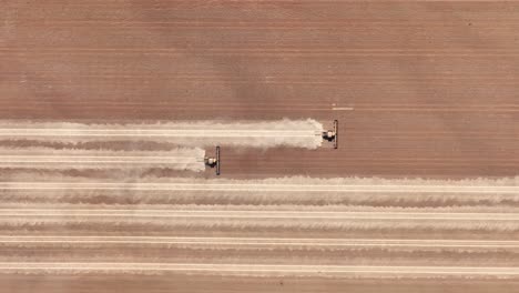 This-footage-captures-the-synergy-of-modern-agricultural-technology,-showcasing-the-essential-role-of-header-fronts-in-the-wheat-harvesting-process