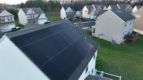 solar panels on large house in american neighborhood