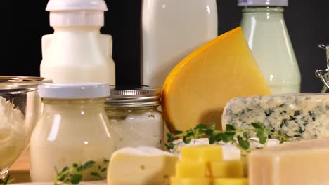 various dairy items arranged on a wooden board