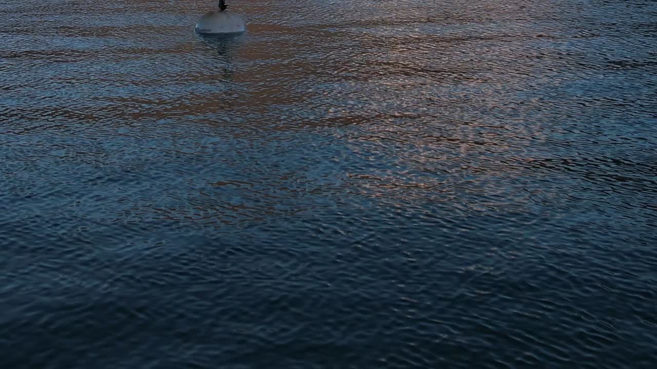 Stunning aerial view of the blue waters reflecting the Alps in Italy