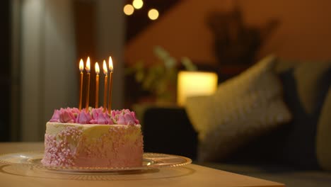 Close-Up-Of-Party-Celebration-Cake-For-Birthday-Decorated-With-Icing-And-Candles-On-Table-At-Home-1