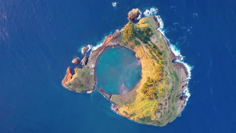 circular crater of vila franca islet in azure atlantic, azores