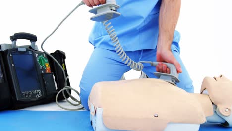 male paramedic during cardiopulmonary resuscitation training