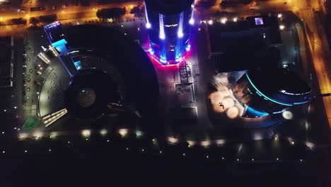 aerial view of modern city buildings at night