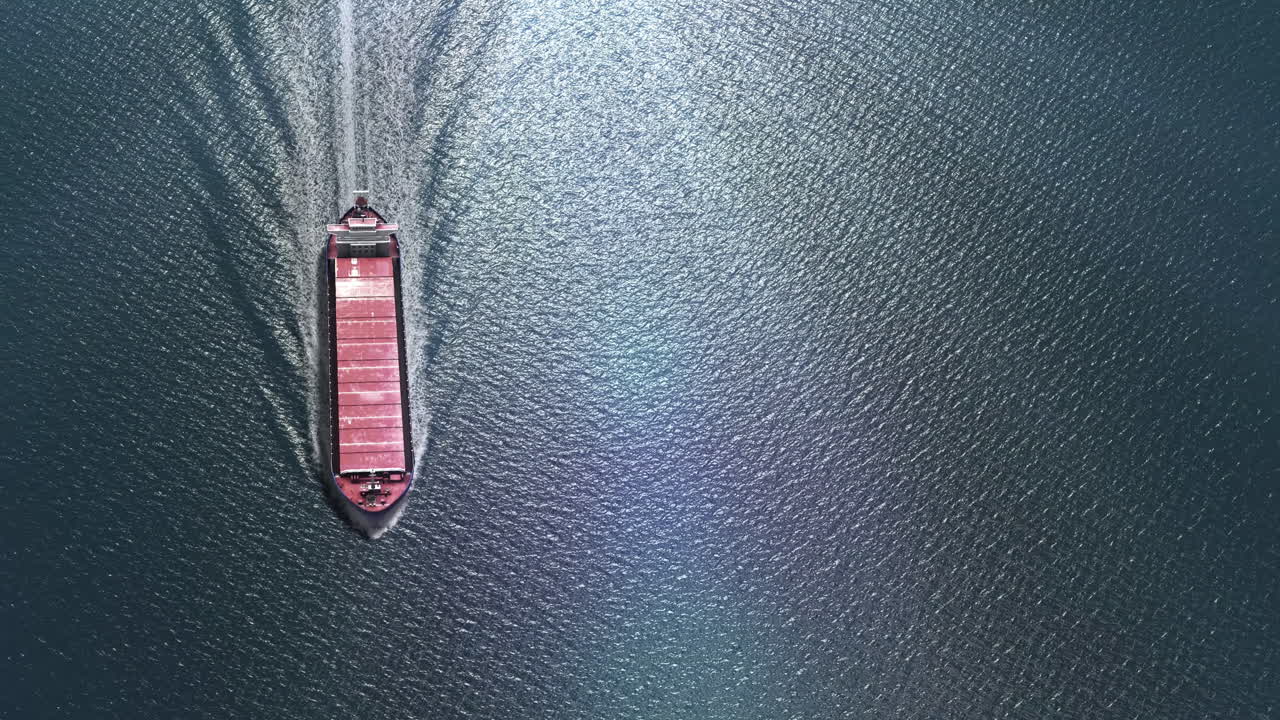 Aerial view of a cargo ship sailing on the ocean