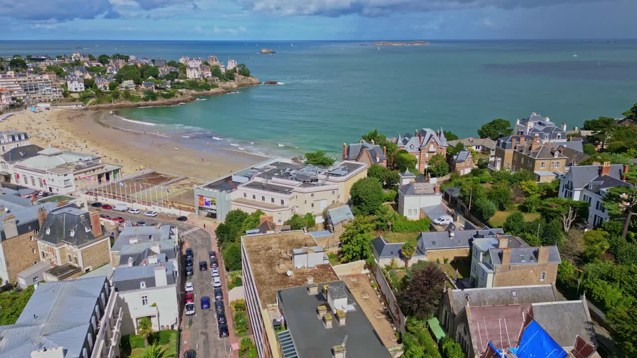 Amazing drone fly at seaside Dinard commune with coastal houses overlooking Plage de l'Écluse beach, Ille-et-Vilaine, France