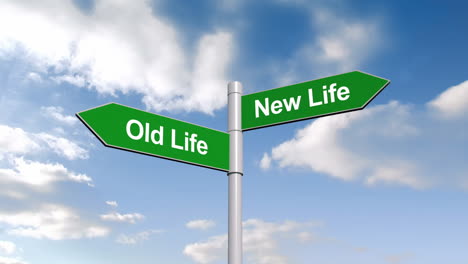 old life and new life signpost against blue sky