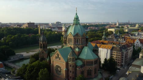 Cinematic-Orbiting-Shot-Above-St-Luke's-Church-in-Munich,-Germany