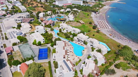 aerial view overlooking pools and villas at the kolymbia beach, in sunny rhodes