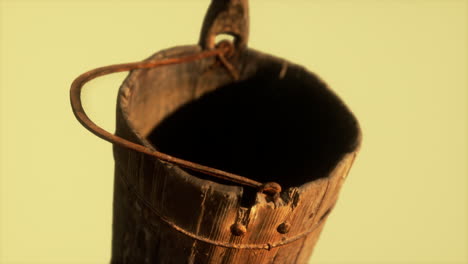 Old-used-rusted-wooden-bucket