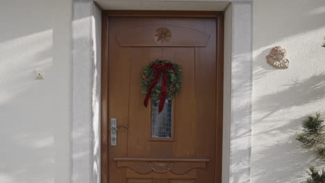 christmas wreath on a wooden door