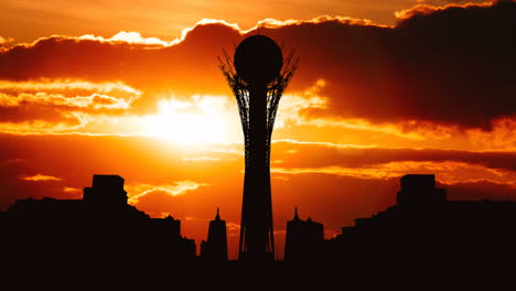 silhouette of a tower at sunset/sunrise