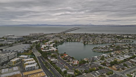 foster city california aerial v1 flyover urban residential neighborhood towards lincoln centre life sciences research campus with san mateo bridge and bay views - shot with mavic 3 cine - june 2022