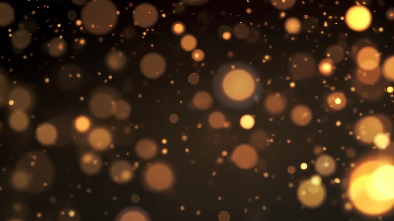 Un video ipnotico di luci bokeh dorate, ripreso da un angolo frontale, che crea un'atmosfera da sogno