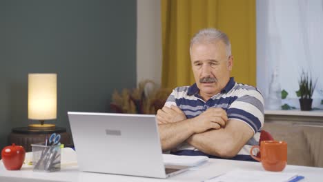 home office worker old man itching with allergies.
