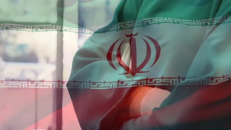 animación de la bandera de irán ondeando sobre los cirujanos con máscaras faciales