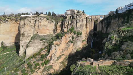 ronda arch bridge puente nuevo in malaga, andalusia, spain - aerial circling