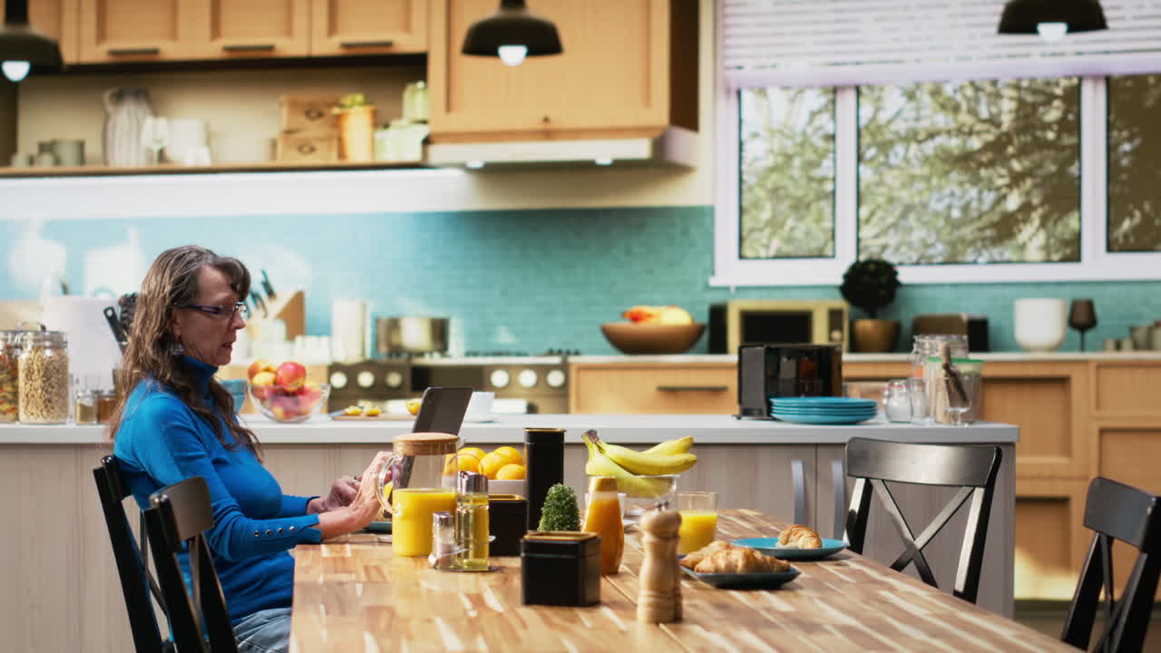 Senior woman eating alone because her husband is running late to an appointment