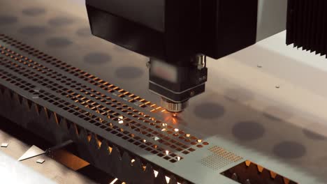 CNC-Laser-cutting-of-metal,-modern-industrial-technology.