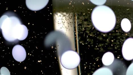 animation of champagne glasses with bubbles, confetti and lens flares falling over black background