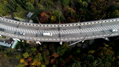 aerial view of a bridge over a valley in autumn