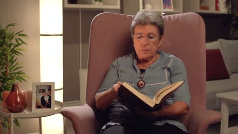 Old-woman-reading-a-book.