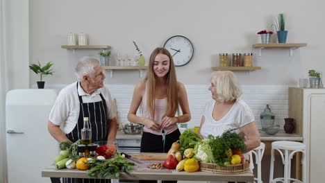 Girl-measuring-with-tape-measure-her-slim-waist-and-braging-in-front-of-grandparents.-Raw-food-diet