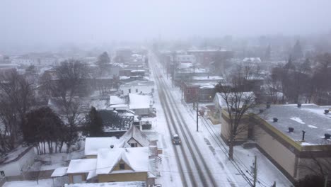 quebec urbanization crossed by a road under a blanket of snow