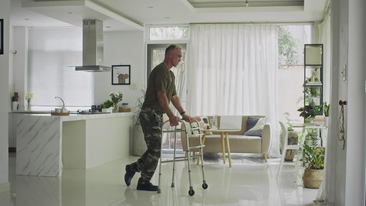 Caucasian Ex-soldier with Disability Using Walker at Home