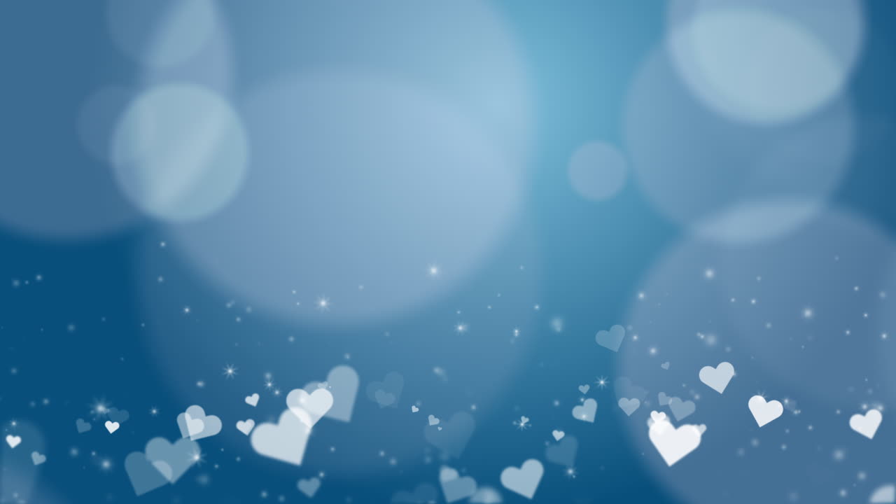 Blue white heart bokeh background. Festive romantic looping animation with empty space for text. Copy space.