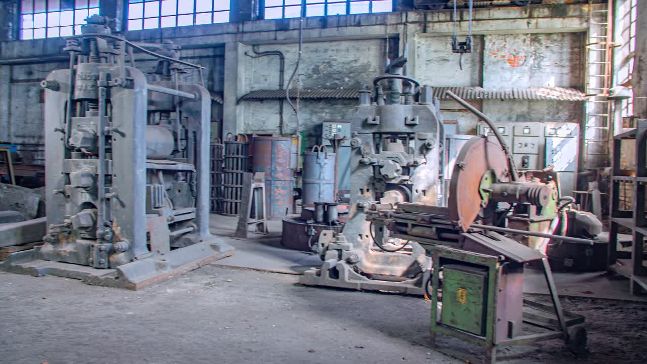 old deactivated metallurgic factory. Heavy machinery and empty storage